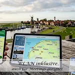 Апартаменты Frohsinn - Gulfhof Nahe Greetsiel Mit Sauna, Garten & 3 Schlafzimmern Крумхёрн